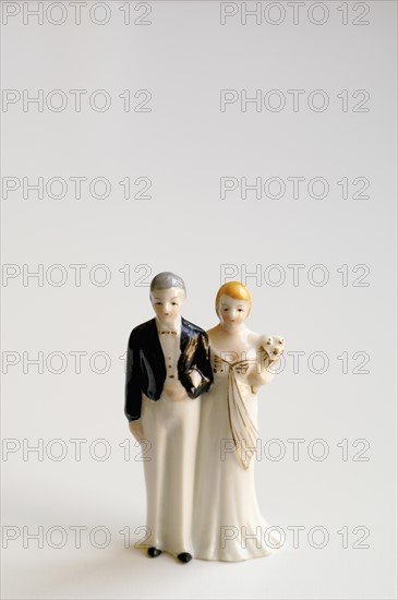 Studio shot of bride and groom figurines. Photo : Antonio M. Rosario