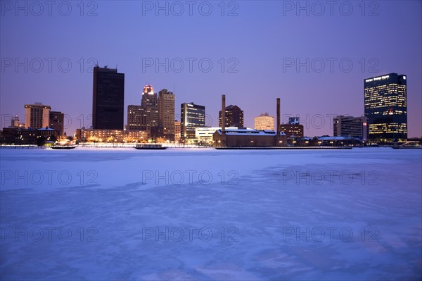USA, Ohio, Toledo skyline across frozen river, dusk. Photo: Henryk Sadura
