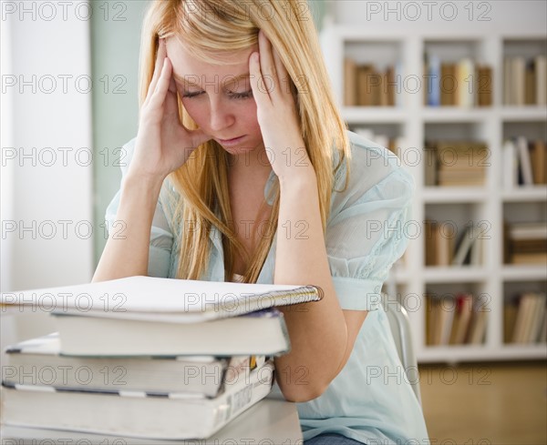 Female student having headache. Photo: Jamie Grill Photography