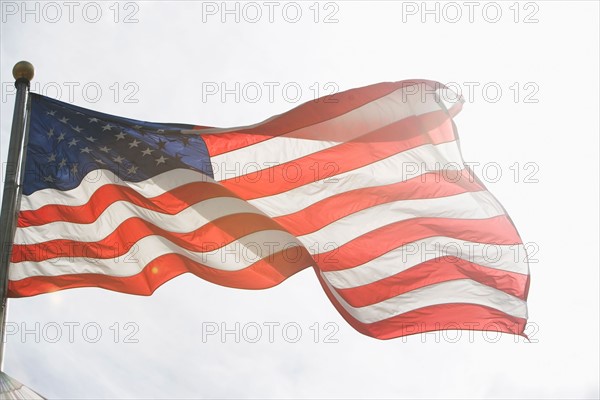 American flag against sky. Photo : fotog