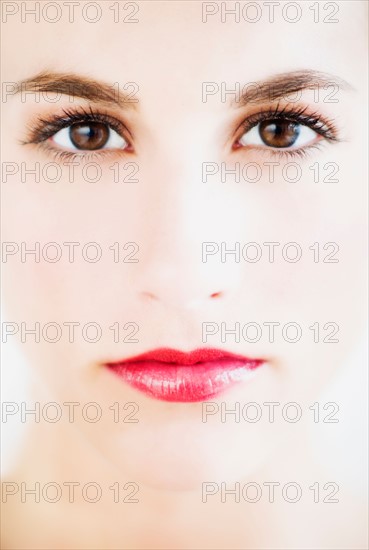 Studio portrait of young woman.