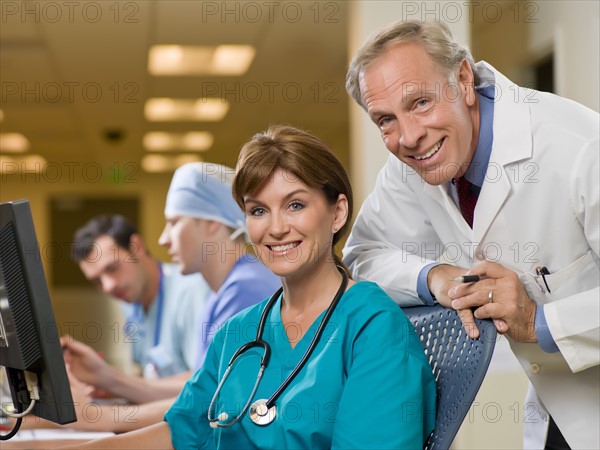 Portrait of female surgeon and male doctor. Photo: db2stock