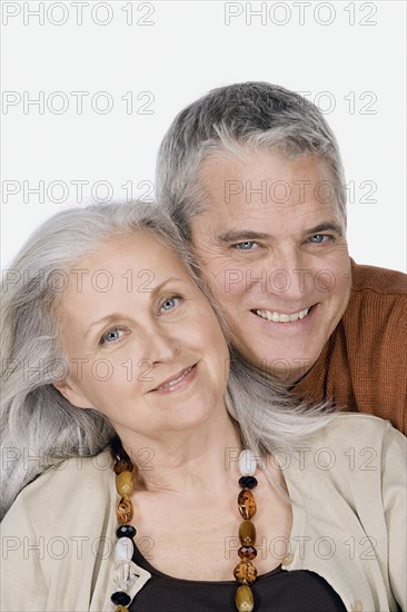 Studio portrait of mature couple. Photo: Rob Lewine