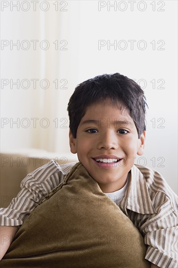 Portrait of smiling boy (10-11). Photo : Rob Lewine