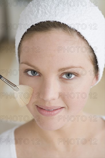 Woman having make-up applied. Photo: Rob Lewine