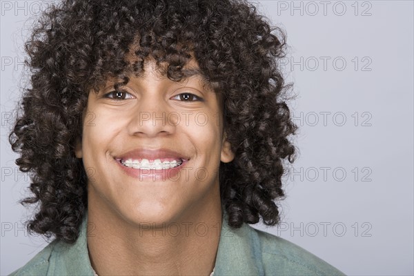 Portrait of teenage boy (14-15). Photo : Rob Lewine