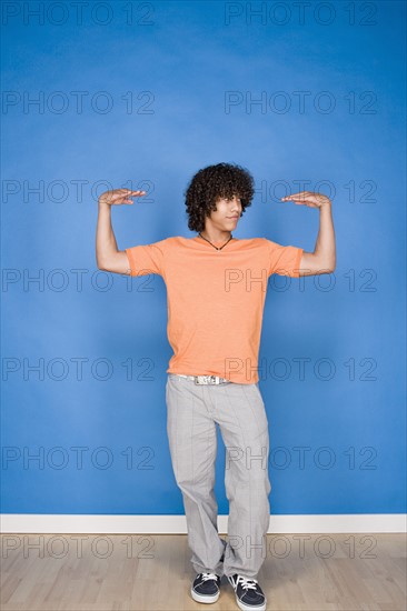 Portrait of teenage boy (14-15) posing. Photo: Rob Lewine