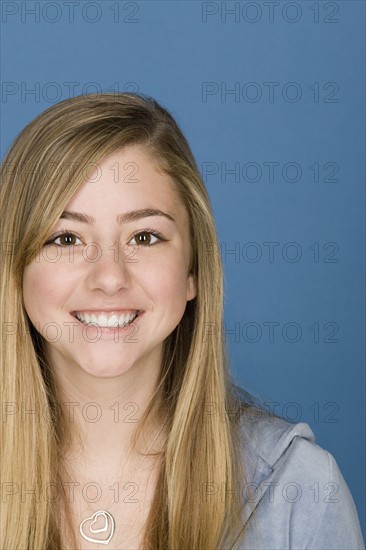 Portrait of happy teenage (14-15). Photo: Rob Lewine