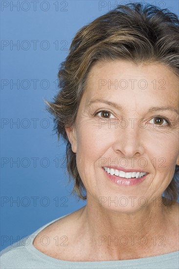 Portrait of happy mature woman. Photo: Rob Lewine