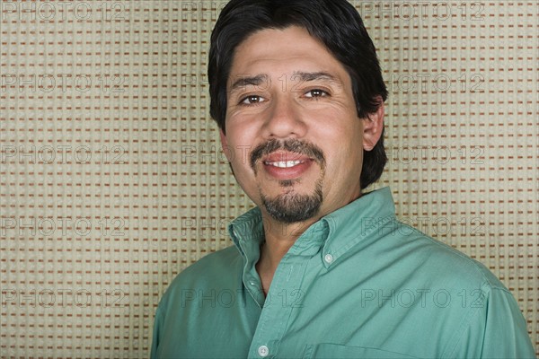 Studio portrait of mature man. Photo : Rob Lewine