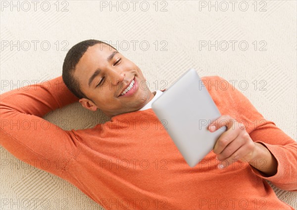 Man reading e-book.