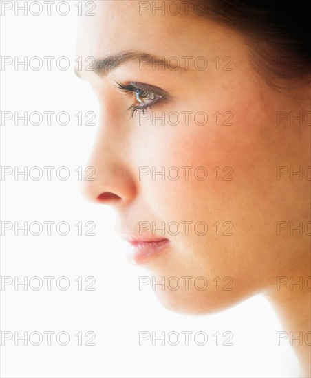 Studio portrait of young woman.