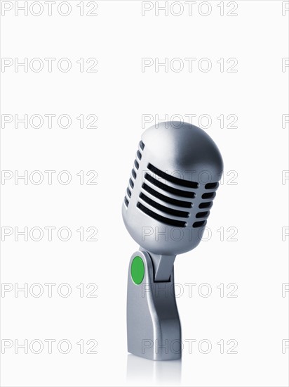 Studio shot of vintage-themed modern microphone on white background. Photo : David Arky