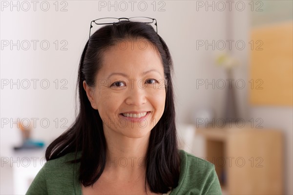 Portrait of woman smiling. Photo : Rob Lewine