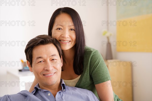 Portrait of couple smiling. Photo : Rob Lewine