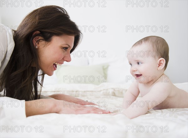 Mother with baby daughter (6-11 months) . 
Photo: Jamie Grill