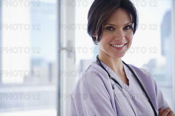 Portrait of female nurse. 
Photo : Jamie Grill