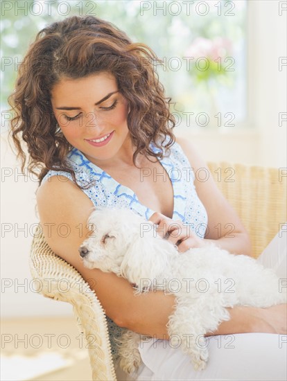 Portrait of woman with dog. 
Photo: Daniel Grill