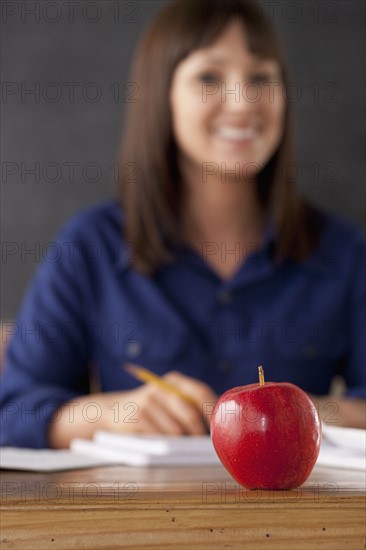 Apple on teacher's desk. 
Photo: Rob Lewine