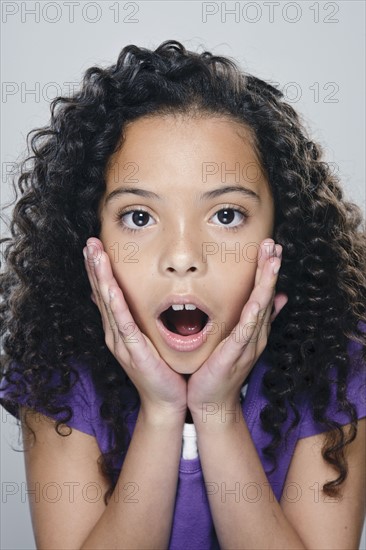 Portrait of girl (10-11), studio shot. 
Photo : Rob Lewine