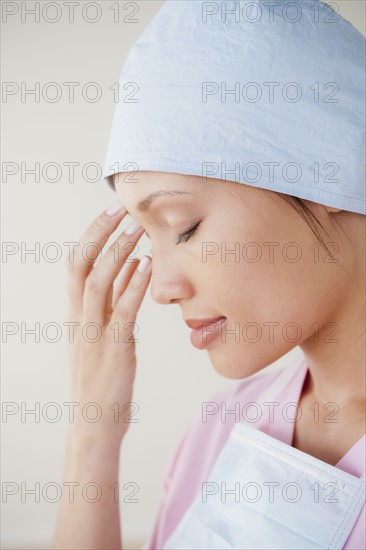 Portrait of doctor wearing surgical mask. 
Photo: Rob Lewine