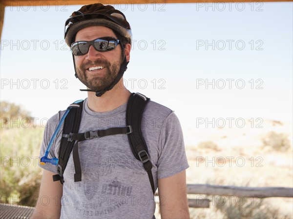 Mid adult man posing in cycling gear. 
Photo: Jessica Peterson