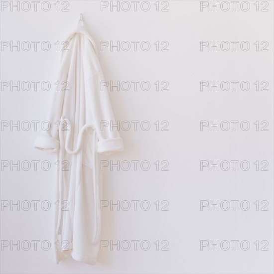 Studio shot of white bathrobe. Photo: Daniel Grill