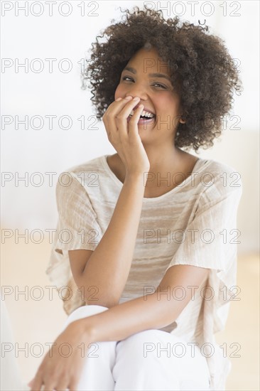 Portrait of woman laughing.