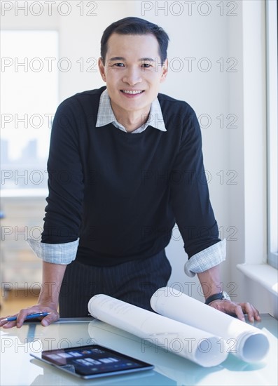 Mid adult architect working in his studio. Photo: Daniel Grill