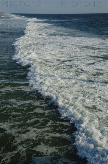 Outer Banks, water's edge. Photo: Tetra Images