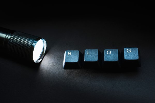 Studio shot of Computer keys with word blog.