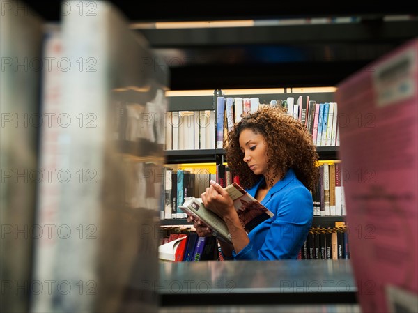 Woman researching library