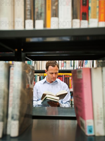 Man researching library