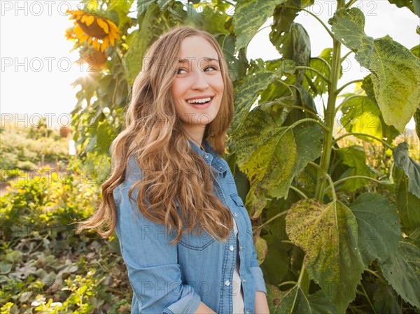 Portrait of young woman in garden. Photo: Jessica Peterson