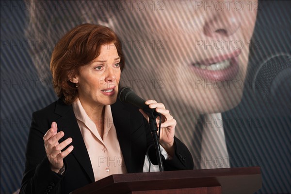 Female politician performing speech.