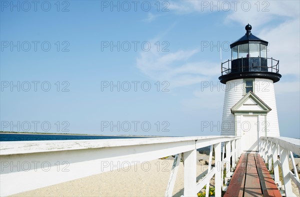 Lighthouse on sandy beach