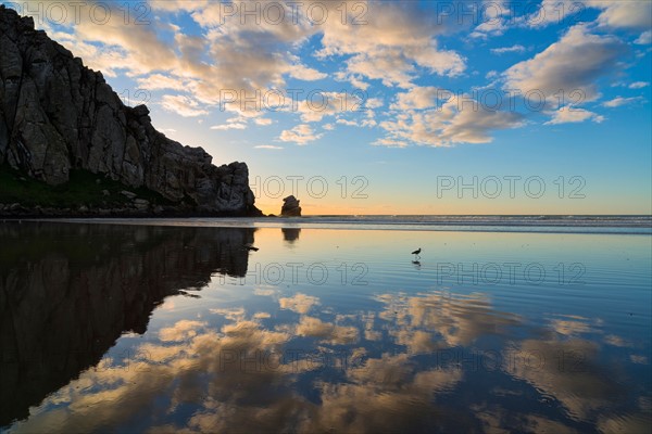 Silhouette of rocks on coast