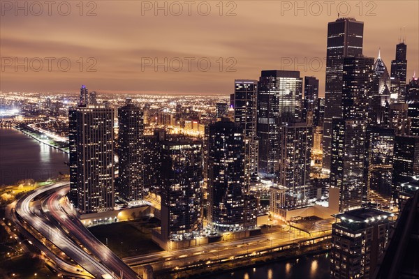 Elevated view of Lake Shore Drive and Chicago architecture at sunset