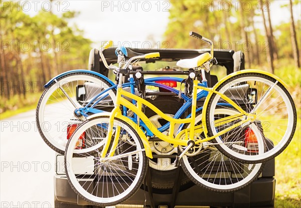 Couple in car with bike rack