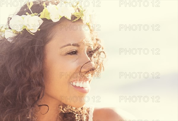 Young woman wearing wreath