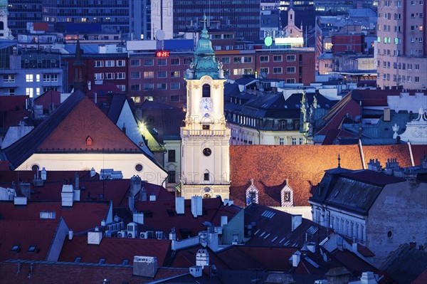 Clock tower among buildings