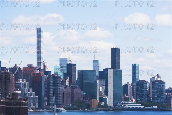USA, New York State, New York City, Manhattan, City panorama seen across East River