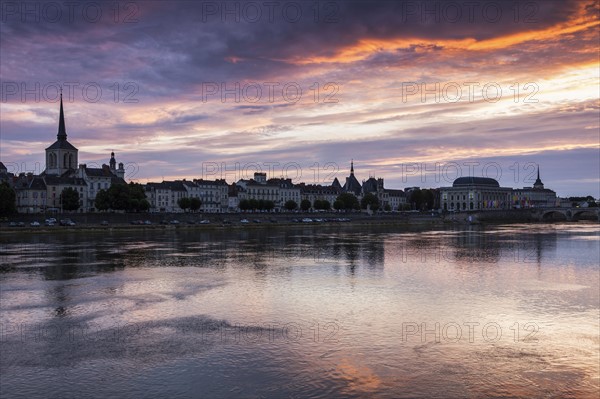 France, Pays de la Loire, Saumur, City waterfront at sunset