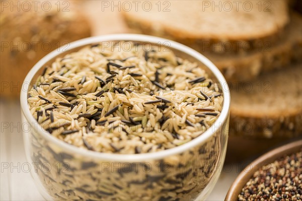 Brown and black rice in bowl