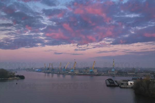 Ukraine, Dnepropetrovsk, Commercial dock at dusk