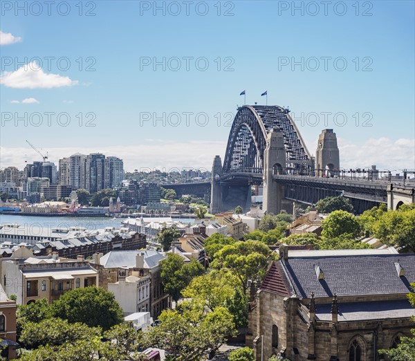 Australia, New South Wales, Sydney, Cityscape and bridge over harbor