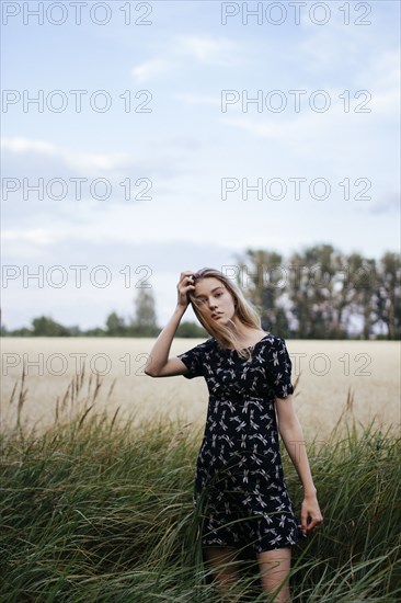 Young woman in field