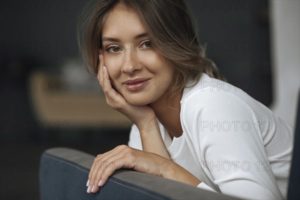 Portrait of young woman wearing natural make-up