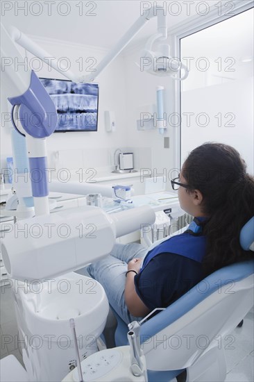 Teenage girl in dentist's chair