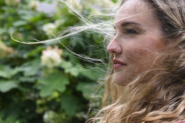 Portrait of windswept young woman